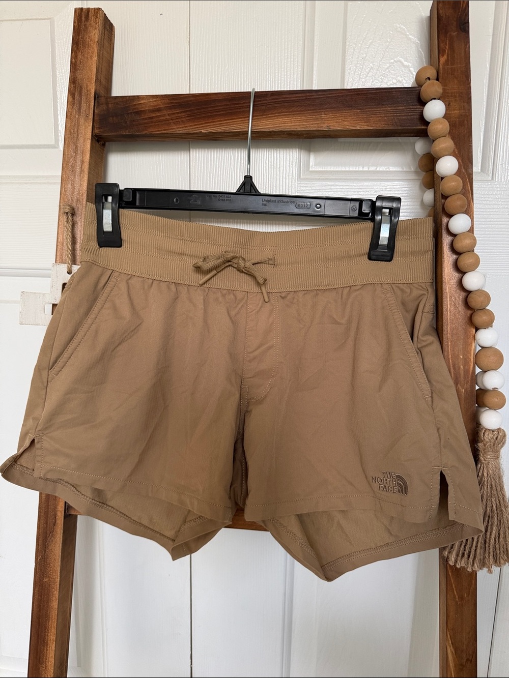 The North Face Women’s Tan Active Shorts. Pockets
